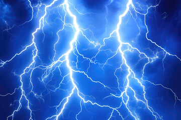 Powerful lightning strikes against a dark blue sky.  Detailed lightning bolts illuminate the scene