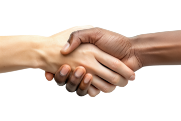 Close-up of diverse hands shaking in unity symbolizing friendship