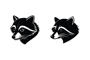 Two black and white silhouettes of raccoon heads in profile and frontal views on a white background © Sumon