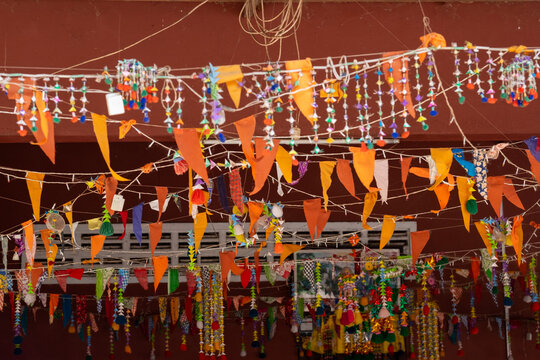 Colorful Festive Decorations Hanging in a Temple