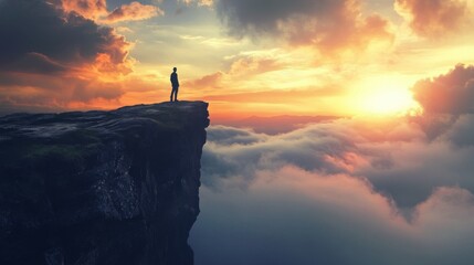 Silhouette of a person standing on a cliff overlooking a vast sunset sky, symbolizing hope, vision, and new beginnings.