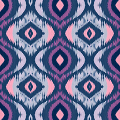 Mystical twilight Ikat with mirrored motifs and optical symmetry, seamless pattern.