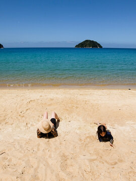 Mother and son, Onetahuti beach, Abel Tasman National Park.