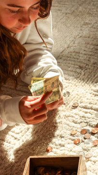 Teen Girl Counting Savings