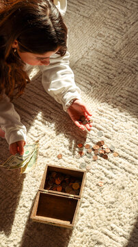 Teen Girl Counting Savings
