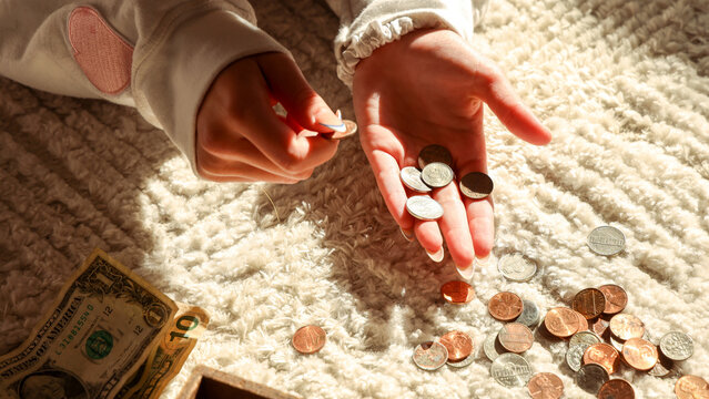 Teen Girl Counting Savings