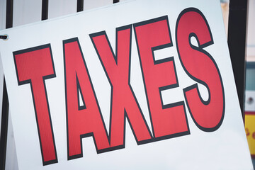 Taxes billboard street sign ad
