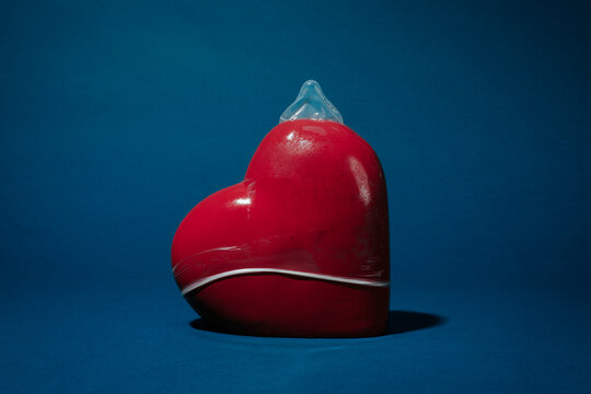 condom covering a porcelain heart