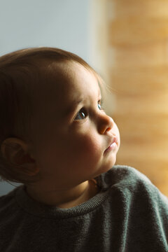 Baby looking up, at a high angle point