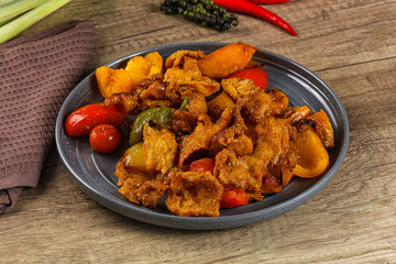 Asian cuisine - roasted crocodile meat