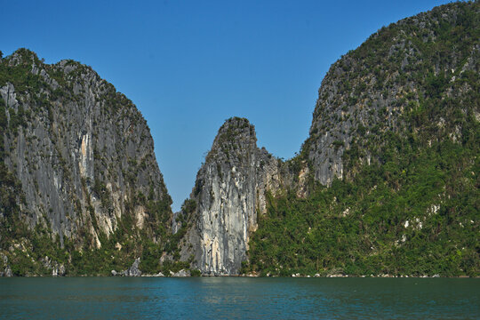 Limestone rock face cliffs of Halong Bay.
