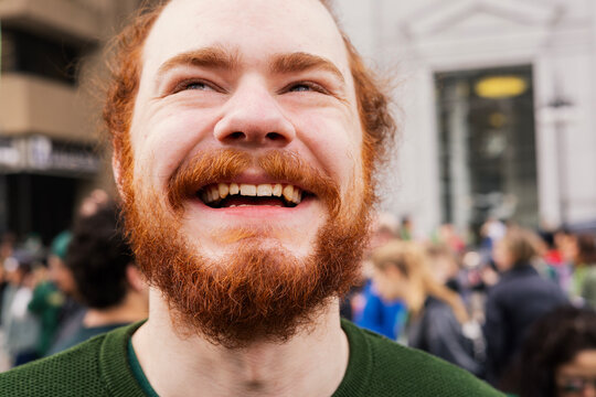 Close up of man laughing at St Patrick's celebration in Chicago
