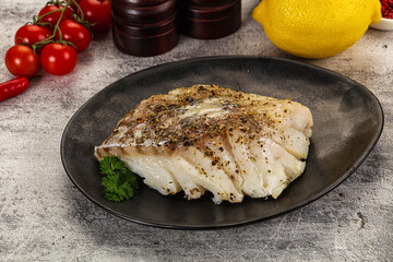 Baked cod fish fillet with spices