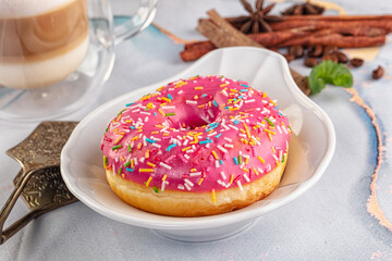 Sweet donut with strawberry icing