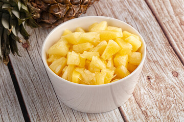 Sweet canned pineapple fruit pieces