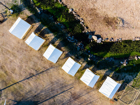 Vertical Aerial View of Campground with Tents