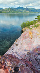Unique stone texture of the pink rock mountain on the island of the Komodo national park, Indonesia