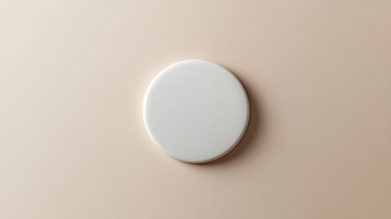A white plastic metal pin badge button mockup is displayed isolated on a light background.
