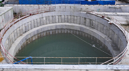 Water-filled Circular Well with Safety Net and Guardrails