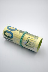 European currency, banknotes rolled into a roll.