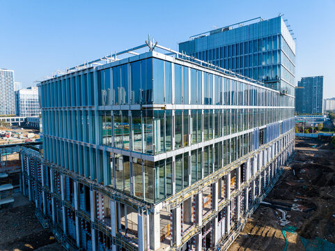 Close-Up of Unfinished Building with Glass Facade