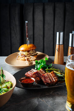 Grilled Pork Belly with Green Beans and Pulled Pork Burger