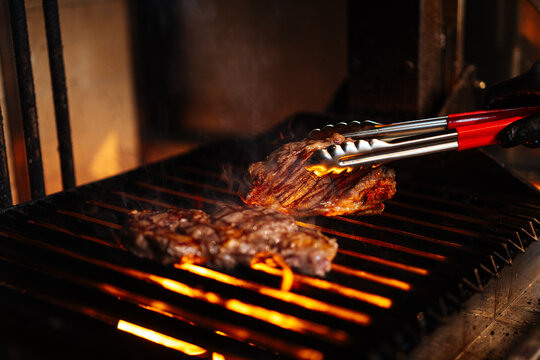 Grilled Steaks Over Open Flames