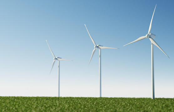 Green energy concept with three wind turbines on a green field
