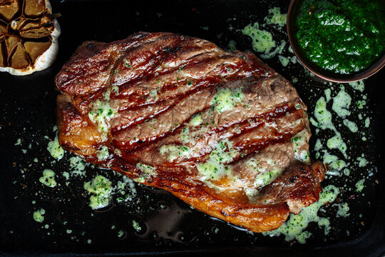 Grilled Ribeye Steak with Herb Butter