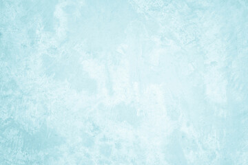 Pastel blue and white concrete stone texture for background in summer wallpaper. Cement and sand wall of tone vintage. Concrete abstract wall of light cyan color, cement texture mint green for design.