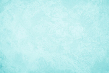 Pastel blue and white concrete stone texture for background in summer wallpaper. Cement and sand wall of tone vintage. Concrete abstract wall of light cyan color, cement texture mint green for design.