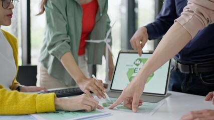 Young Asian business team discussion reusable product in office,start up eco-friendly business,environmental protection,sustainable business model,ESG strategy,team meeting,people work at home concept