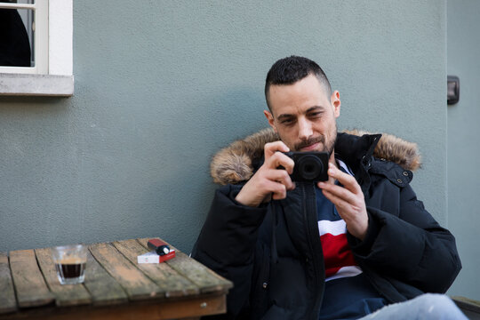 Portrait of man taking a picture of the photographer
