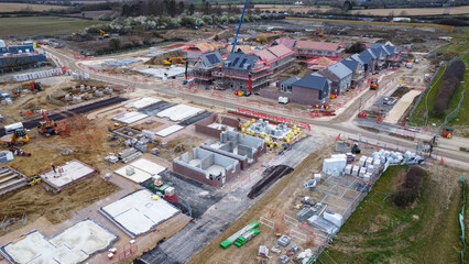 A drone shot of a building site for a housing estate.