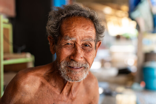 Elderly Man in Thai Low-Income Community
