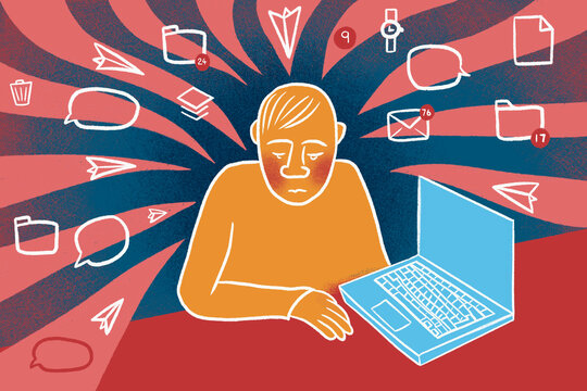 A demotivated business worker surrounded by a backlog of tasks