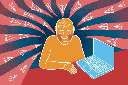 A Businessman overwhelmed by many incoming emails