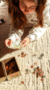 Teen Girl Counting Savings