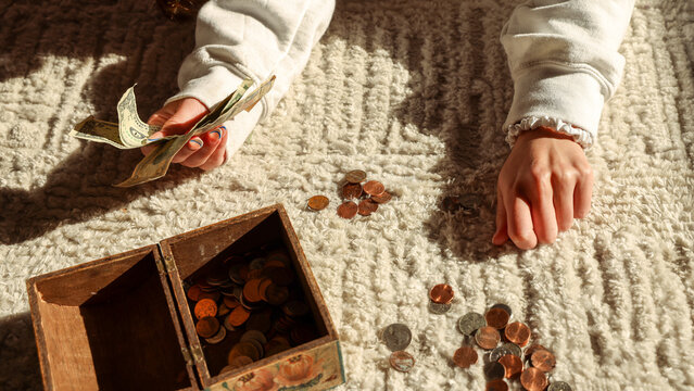 Teen Girl Counting Savings