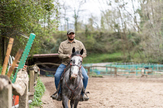 Venezuelan Horse Rider Trotting in Paddock