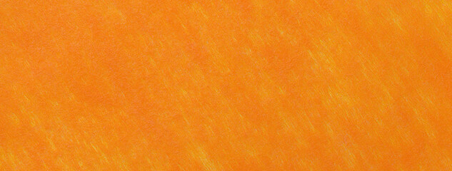 Texture bright orange felt background with spots of fabric, macro. Structure of red woolen textile with pattern.