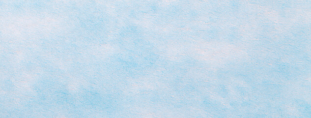 Texture light blue felt background with spots of fabric, macro. Structure of sky pastel woolen textile