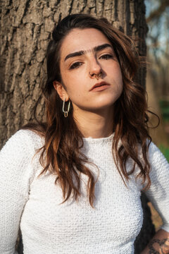 Outdoor Portrait of a Confident Woman with Thick Bushy Eyebrows 