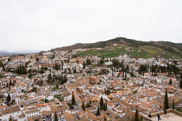 A panoramic view of the City of Granada in Spain on a cloudy morning as seen from the Alhambra Palace.