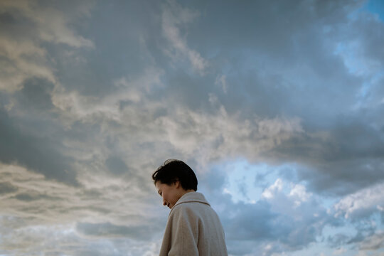 Twilight, a woman facing sudden weather changes.