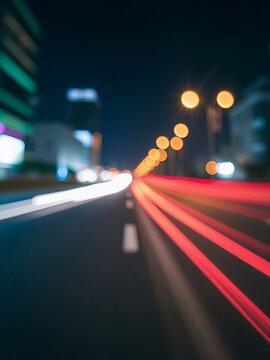 an image of a blurry photo of a city street at night, there is a blurry image of a city street at night