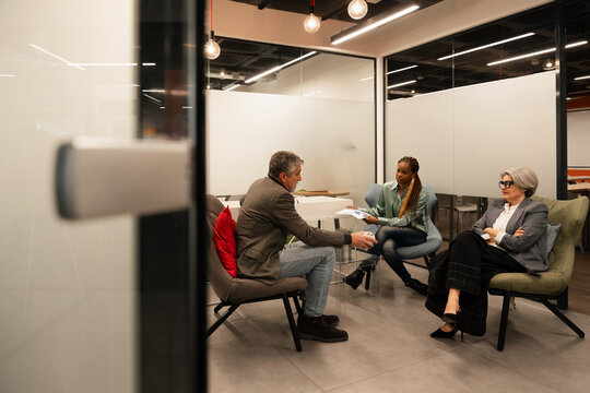 Business discussion in modern office meeting room