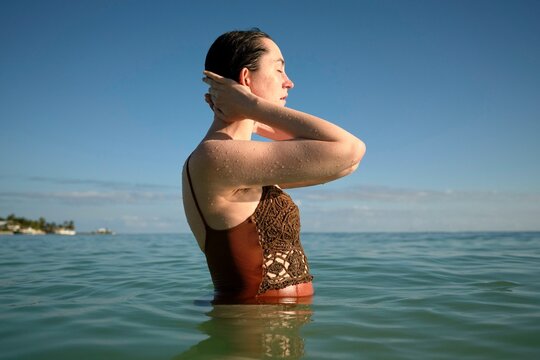 Joyful moments of serenity in sun-soaked waters 