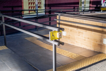 Wheelchair ramp and emergency button  for people with disabiliti