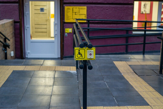 Wheelchair ramp and emergency button for people with disabilities